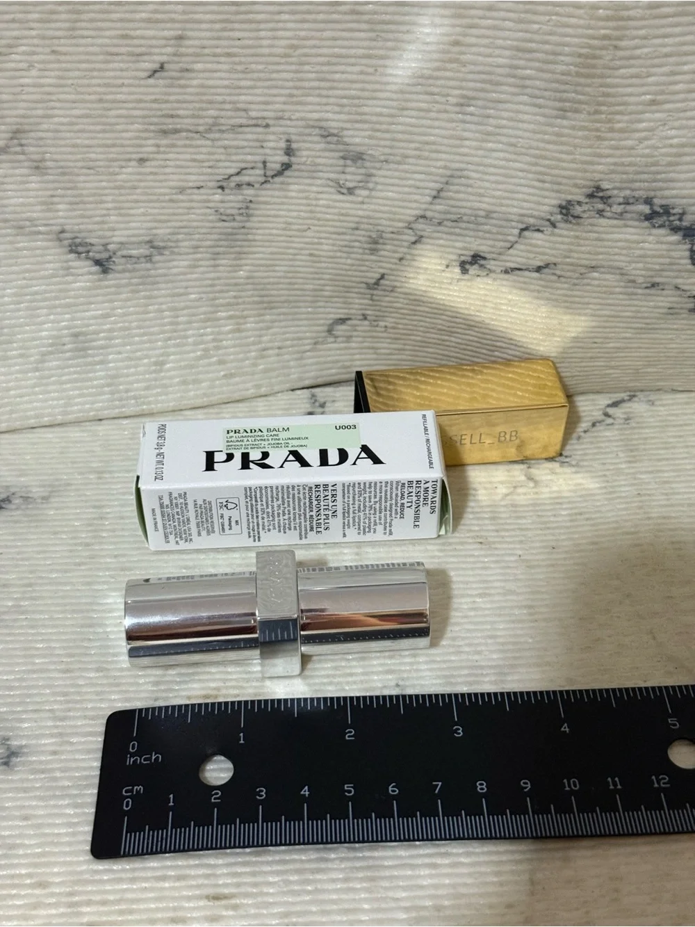 Prada Balm in U003 Wisteria Gleams PH Pinky Lilac Finish with Iridescent Shimmer